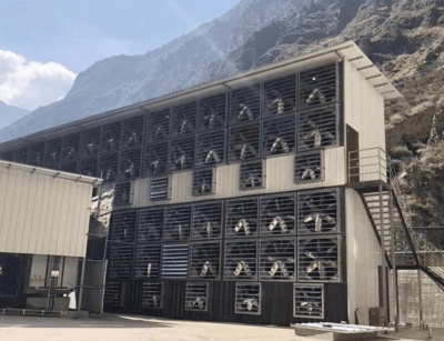 A sprawling mining farm hums with activity, rows of mining rigs diligently processing data and securing the blockchain.