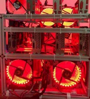 A close-up of a mining rig, highlighting the intricate network of GPUs or ASICs
